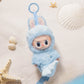 Peluche Créature marine joueuse – Figurine pendentif vinyle style Labubu 17,5 cm