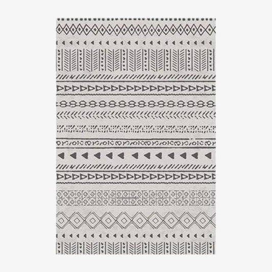 Tapis rectangle aux motifs géométriques noirs et beiges style Keecy