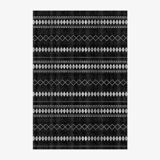 Tapis rectangle aux motifs géométriques noirs style Keecy