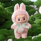 Créature parfumée pastel – Figurine porte-clé vinyle 17 cm au look espiègle