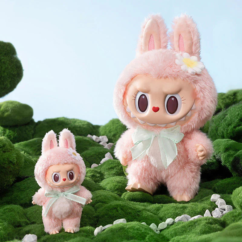 Créature parfumée pastel – Figurine porte-clé vinyle 17 cm au look espiègle