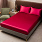 Parure de lit satinée unie – Luxe opulent pour une chambre royale