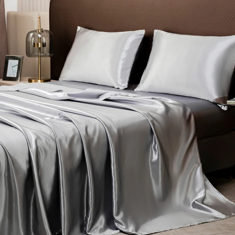 Parure de lit satinée unie – Luxe opulent pour une chambre royale
